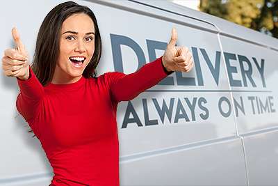 Woman with thumbs up in front of Townsville Fleet delivery van