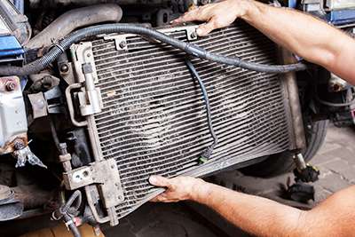 Townsville Mechanic replacing damaged radiator