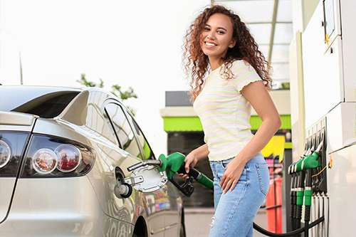 WOMAN FUEL CAR TOWNSVILLE SERVICE STATION